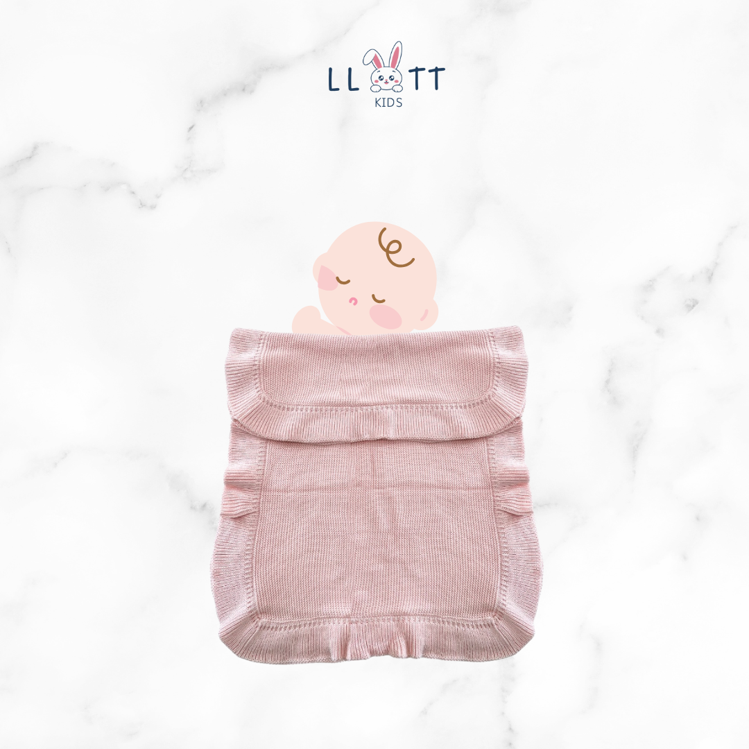 Light pink woven blanket
